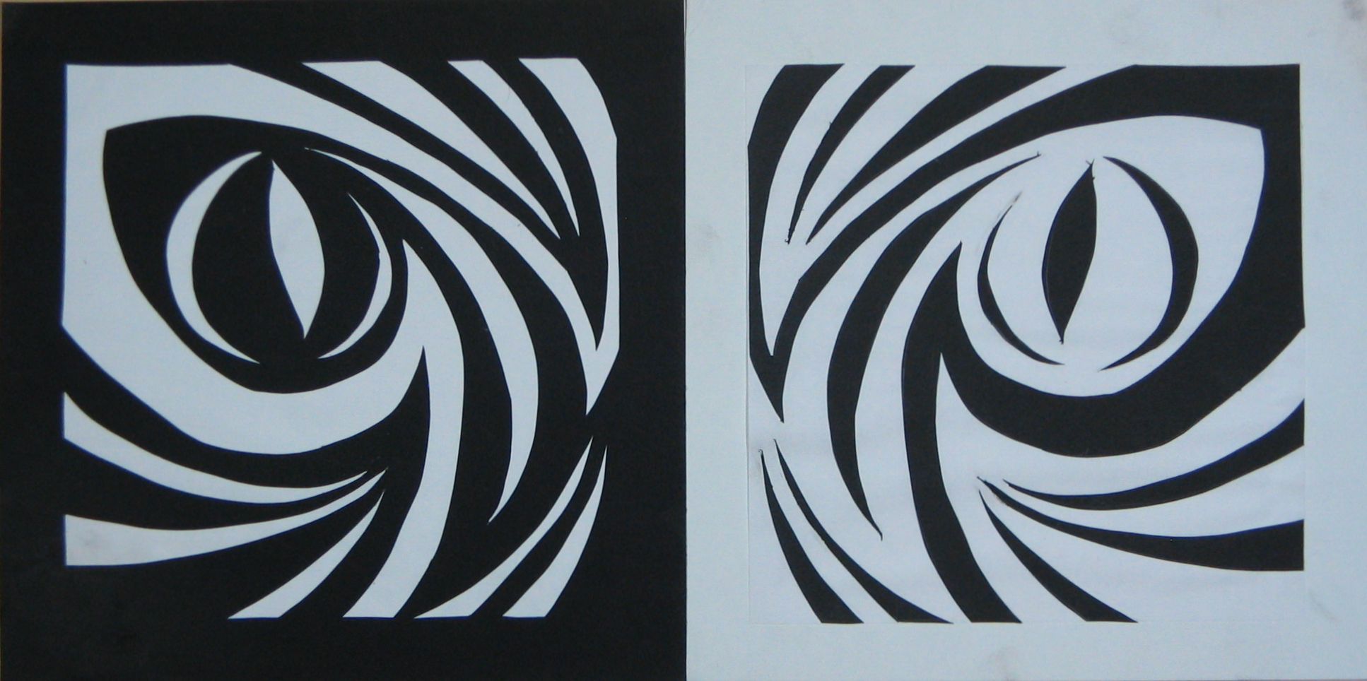 Swirling eye shapes, left side is white on black and right side is black on white